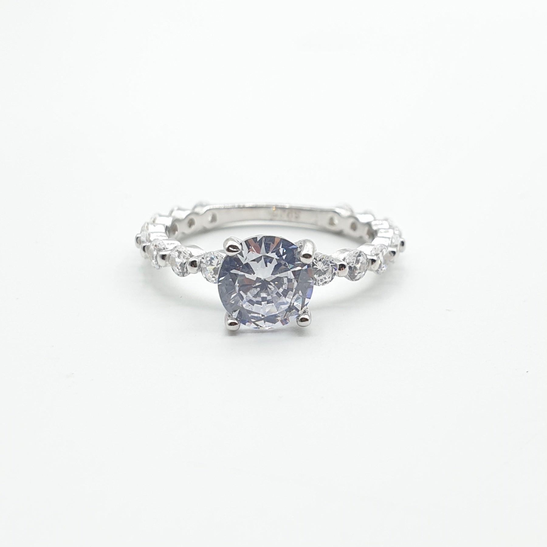 Bague Argent Rhodié Garanti solitaire les pierres tout autour