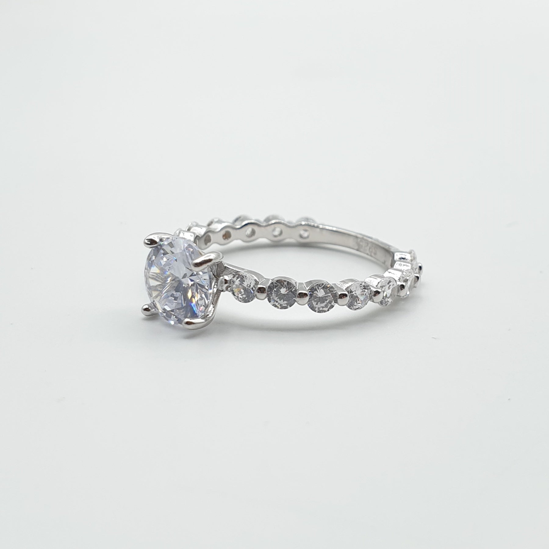Bague Argent Rhodié Garanti solitaire les pierres tout autour
