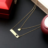 Collier acier inoxydable 2 lignes cœur puzzle