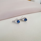 Boucle d'oreille argent Rhodié garanti œil pierre bleu