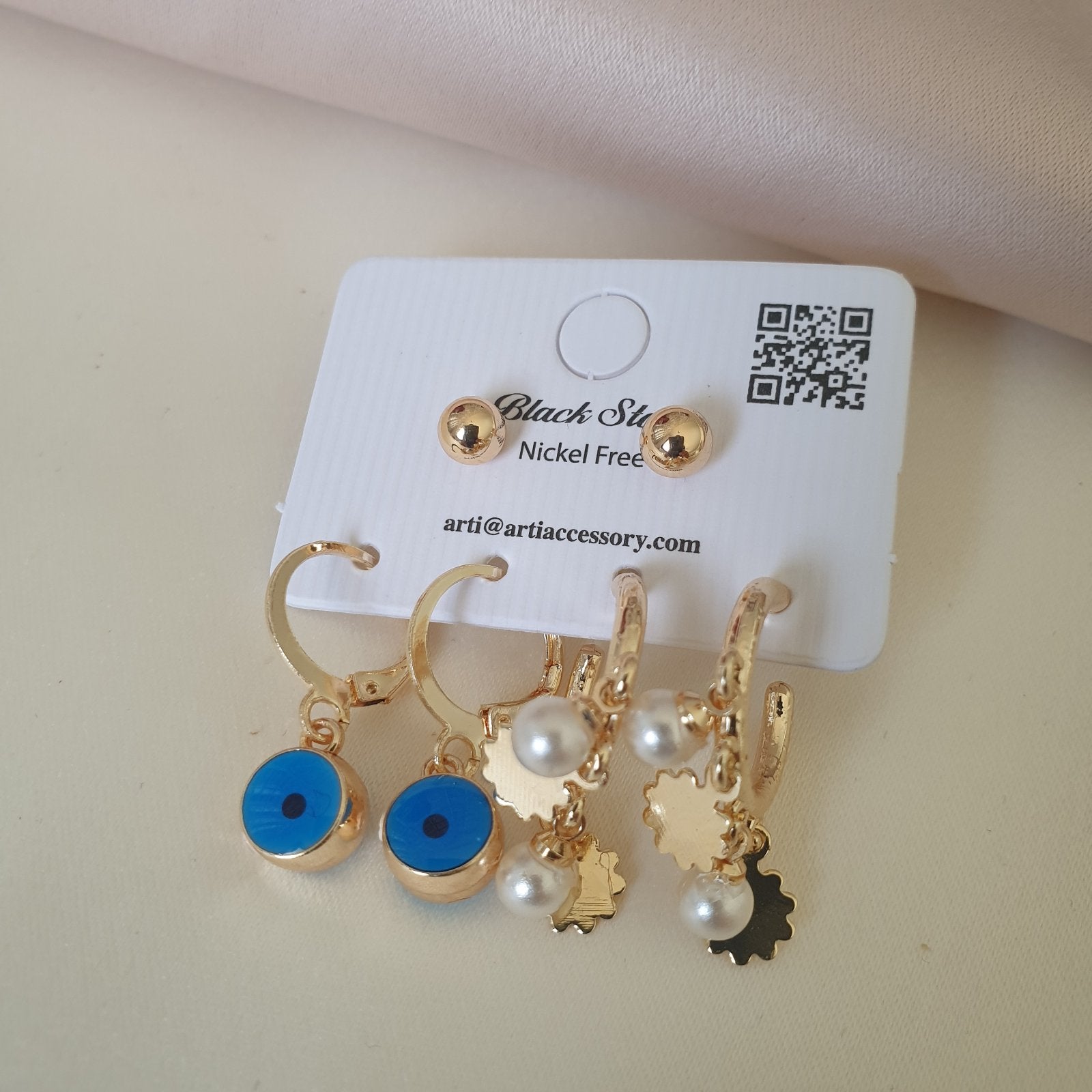 Lot de boucles d'oreilles bijoux de fantaisie œil bleu Shakira bijoux 400