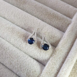 Boucle d'oreille argent Rhodié garanti œil pierre bleu