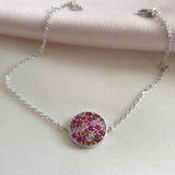 طقم من الفضة المطلية بالروديوم مكون من 4 قطع مكفولة بأحجار حمراء